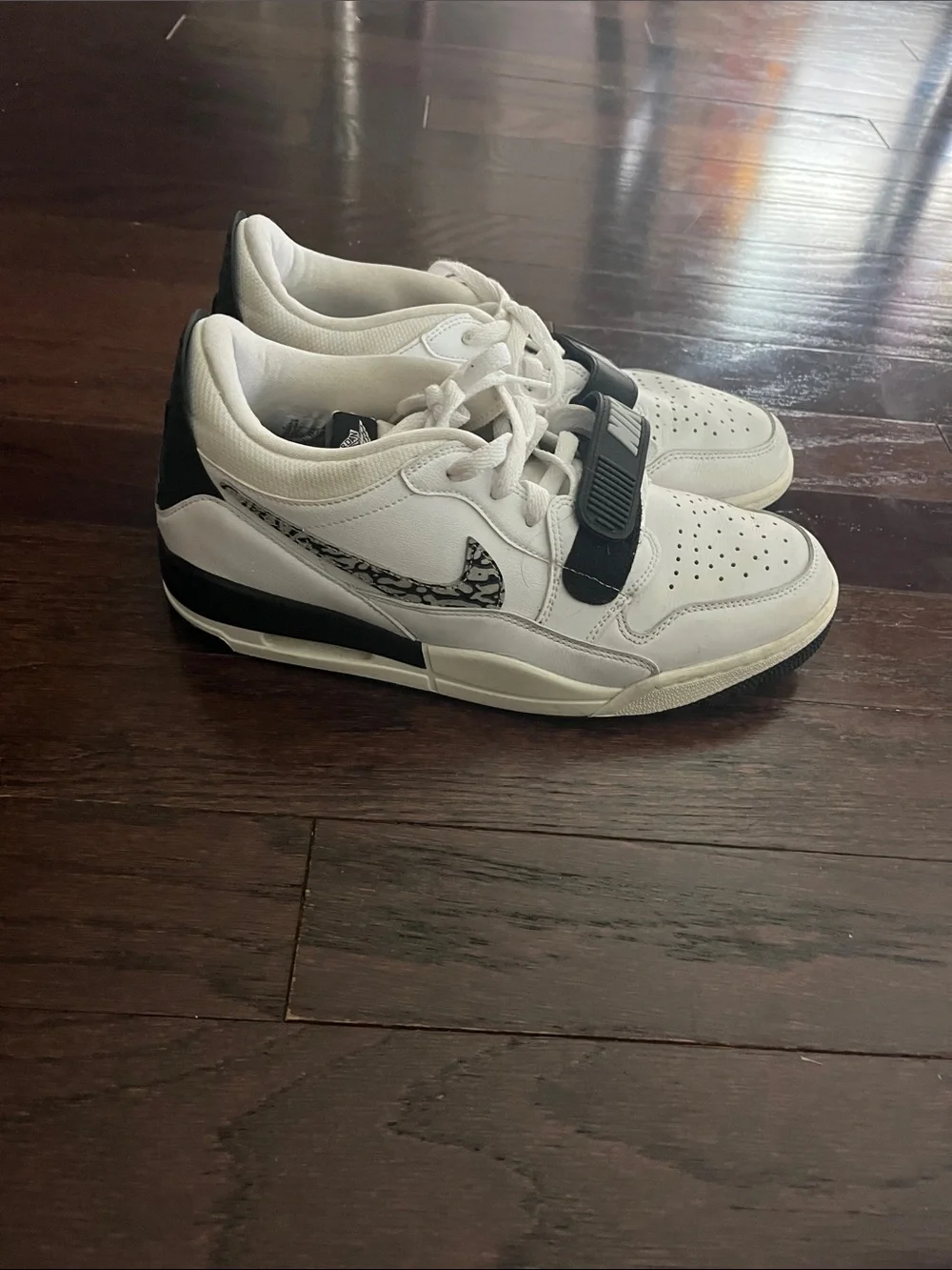 Nike White Low-Top Sneakers with Black Strap Accents